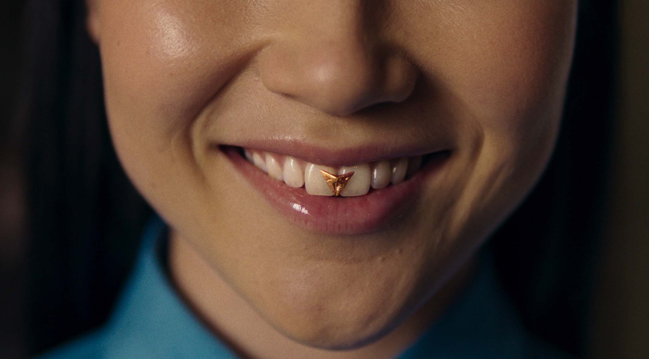 Artist Rosalía CUPRA logo her teeth Artist Rosalía CUPRA logo her teeth